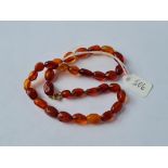 A vintage amber bead necklace