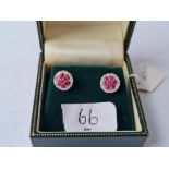 An attractive pair of boxed ruby & diamond cluster earrings in 9ct