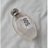 A oval Victorian silver topped scent bottle with faceted glass body, Birmingham 1897