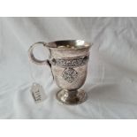 A good quality mug with Celtic strap work 4 inches high London 1910 by MNW 264 gms