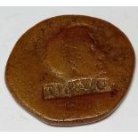 A Roman Augustus copper as of cina 16BC stamped TIB AVG in oblong incujs for continued circulation