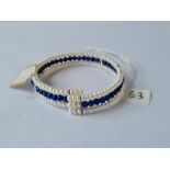 A seed pearl & lapis lazuli extending bangle