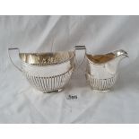 A good and half fluted cream jug and matching sugar basin 6 1/2 inches over handle, Birmingham