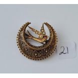An antique crescent & swallow brooch set with pearls in 15ct gold