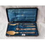 A French silver mounted serving set with ham bone holder fitted box