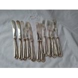 A set of six pairs of dessert eaters with silver handles Birmingham 1939