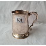 A George II half into mug with leaf capped and handle and rim foot 3 1/2 high, London 1790 by IS 200