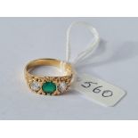 A green & white green stone dress ring in 9ct - size O - 3.3gms