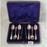 A boxed set of six plain o. ep tea spoons plus tong London 1933 99 gms