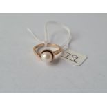 A pearl ring marked 9ct - size N - 3.8gms