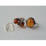 Two amber rings - 1 x silver