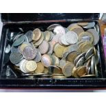 A cash tin of coins