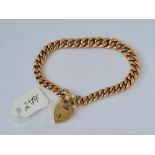 Curb link bracelet with heart padlock clasp in 9ct 11g
