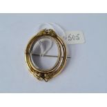 A Victorian gilt swivel mourning brooch