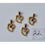 Four small witches heart stone set 9ct pendants 2.3g