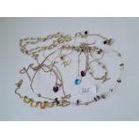 A bag of silver necklaces & bracelets