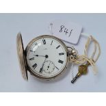 A ladies silver hunter pocket watch with key - numered 27211 with seconds dial