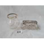 A dressing table jar and a vase with glass bodies