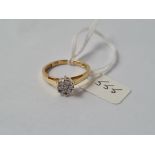 A yellow & white gold fancy diamond cluster ring in 18ct gold - diam weight in shank is 0.25cts -