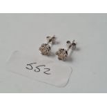 A PAIR OF DIAMOND STUD EARRINGS IN 18CT WHITE GOLD & PLATINUM - diam weight approx. 0.70cts