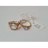 Two white stone dress rings in 9ct - size P & L - 5.7gms