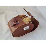 A pair of good quality hair brushes engine turned in leather case Birmingham 1960