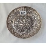 A decorative foreign silver bowl chased with flower heads 7 inches dia 245 gms