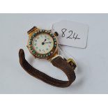 A pearl & turquoise mounted ladies wrist watch in 9ct