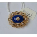 A gold lapis lazuli & diamond pendant brooch