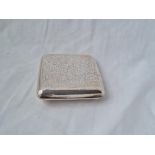 A cigarette case curved body engraved with scrolls B'ham 1918 110 gms