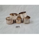 A group of 5 various napkin rings 107 gms