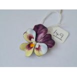 A art nouveau silver & enamel brooch in the form of pansies