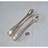 Two pairs of sugar tongs one pair 1808 and the other 1871 by GA 97 gms