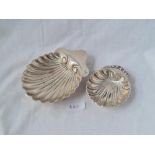 Two shell decorated (one sterling ) butter dishes one London 1906 98 gms