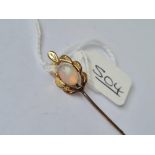 A fancy gold stick pin set with a solitaire opal - 8mm x 6mm (pin not gold)