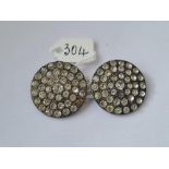 A pair of vintage paste buttons