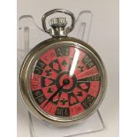 A vintage gaming pocket watch (when wound the mechanical arm spins round landing randomly on a