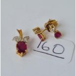 A pair of ruby & diamond earrings in 9ct with matching pendant