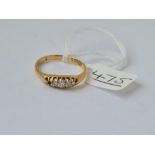 A diamond ring in 18ct gold - (1 stone missing) - size O - 3.1gms