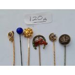 Seven assorted gold, silver & metal stick pins