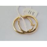 A pair of large hoop earrings in 14ct gold - 3.5gms