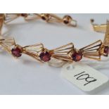 A matching 11 stone garnet bracelet