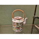 A Canton tea pot & cover, enamel with birds & insects - 9" high