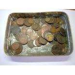 A tin of interesting world coins