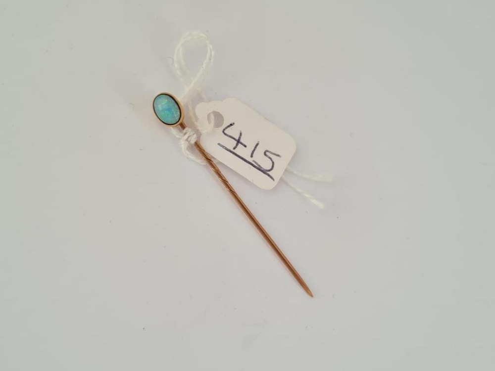 A opal mounted stick pin in gold - Image 2 of 2