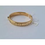 A rolled gold bangle