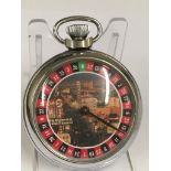 A vintage gaming pocket watch (when wound the mechanical arm spins round landing randomly on a