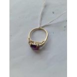 An amethyst & diamond ring in 10ct gold - size N - 2.3gms