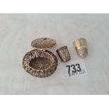 A oval filigree box and 2 silver thimbles one by CH