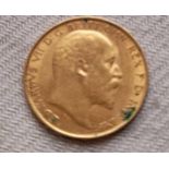 A gold half sovereign 1909